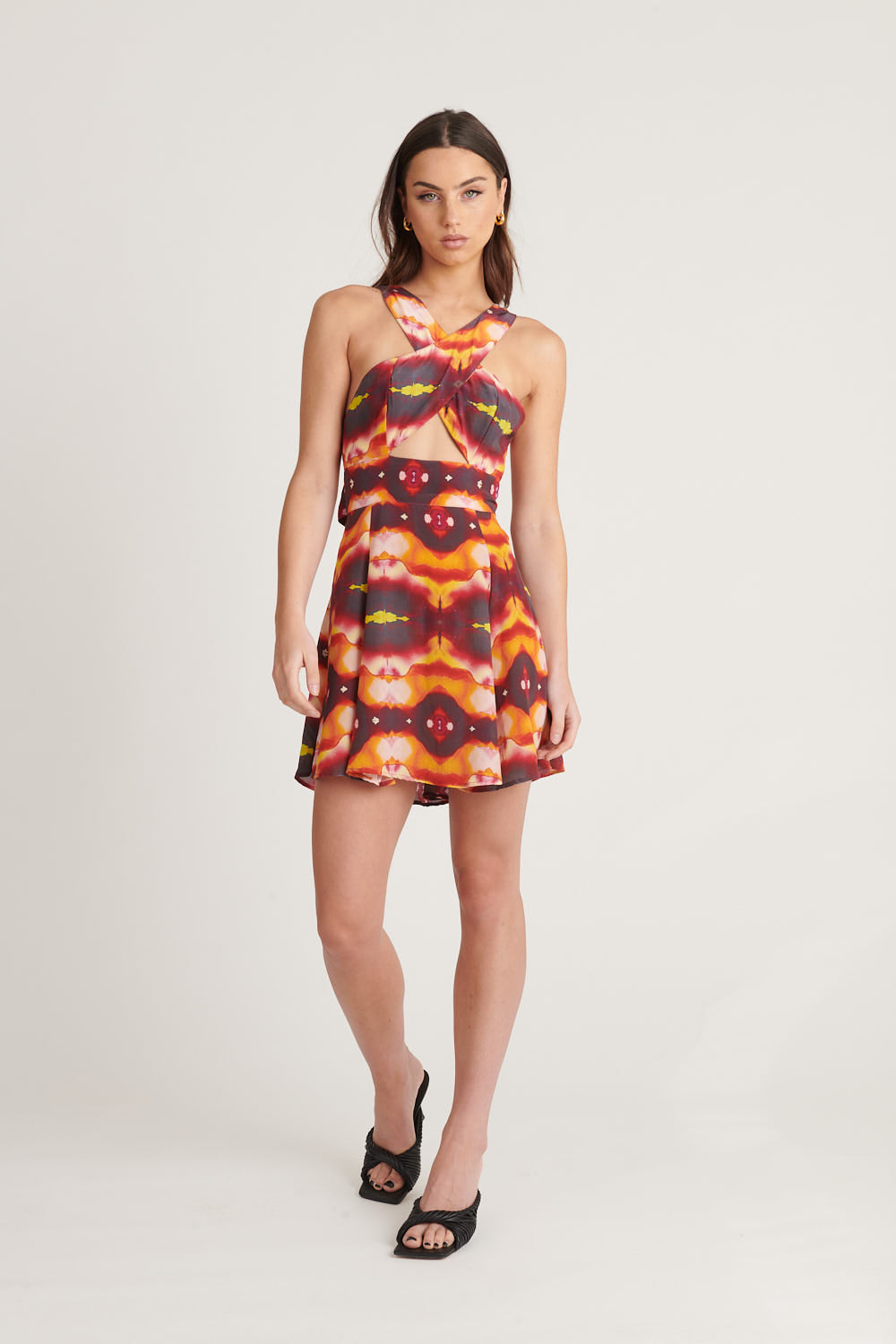 Cut out Dress with fitted top with flared bottom. Sunset Silk